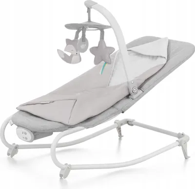 A baby bouncer with a mobile attachment and a blanket.