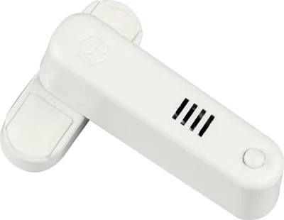 Two white electronic devices are placed diagonally on a white background.