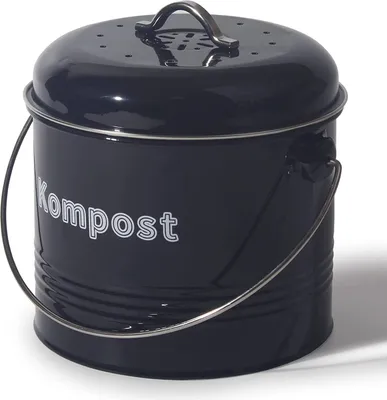 A black metal compost bin with a silver handle and trim, sitting on a white surface with a shadow.