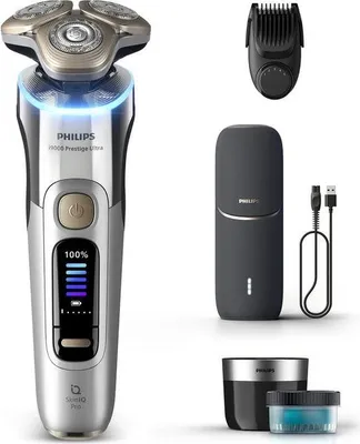 Produktbild von Philips i9000 Prestige Ultra XP9404/46 Elektrischer Nass- & Trockenrasierer mit SkinIQ Pro, Rotationstrasierer, Chrom, Triple Action Lift & Cut System; NanoTech Dual Precision blades, LCD, GroomTribe; Connects via Bluetooth, Replace every 2 yrs with SH91
