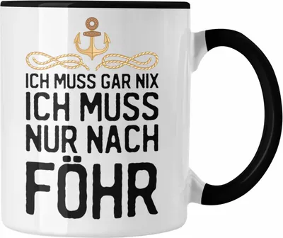 Produktbild von Trendation - Insel Föhr Geschenk Tasse Geschenkiee Ich Muss Gar Nix Ich Muss Nur Nach Föhr Kaffeetasse (Schwarz)