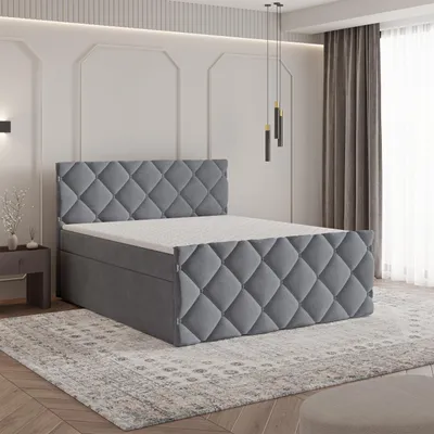 A bedroom setting with a bed as the main focus.