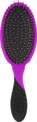 A purple and black hairbrush is shown against a white background.