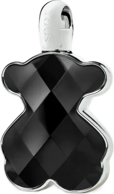 A black, faceted perfume bottle shaped like a bear with a silver cap.