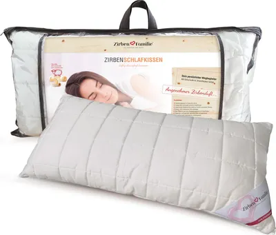 A pillow in its packaging, with a woman sleeping on a similar pillow in the background.