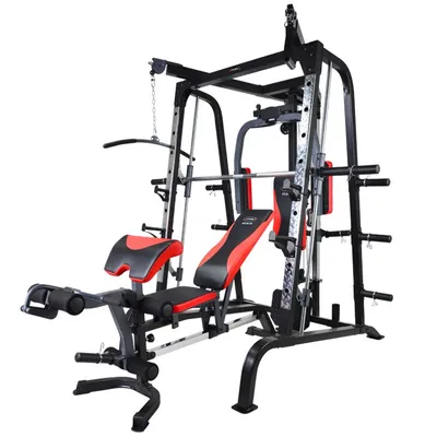 A multi-gym fitness machine with various attachments and padded seats, shown against a white background.