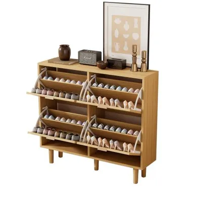 A wooden shoe cabinet with multiple flip-out shelves, filled with shoes.