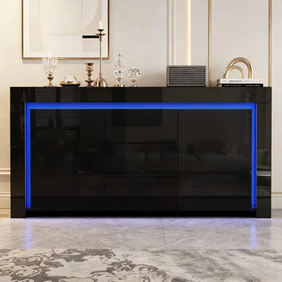 Zdjęcie produktu dla Czarna komoda z frontami w wysokim połysku, o wymiarach 140x40x65 cm, z 2 drzwiczkami, wykonana z MDF, z 3 szufladami i oświetleniem LED, idealna do salonu, przedpokoju i biura