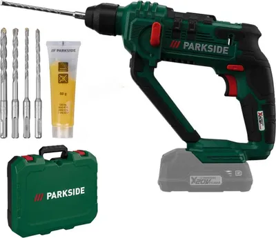 A cordless hammer drill kit with accessories, including drill bits, grease, and a storage case, is displayed against a white background.