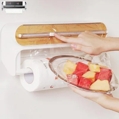 Produktbild von 2-in-1 Küchenrol- und Folienroller mit Cutter - Wandhalter ohne Bohren