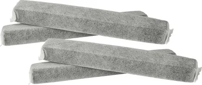 Four gray, rectangular charcoal filters are arranged in two stacked pairs, slightly overlapping.