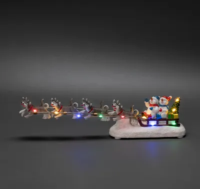 Produktbild von Konstsmide Schneemann mit Hundeschlitten, 10 bunte LEDs, batteriebetrieben (2x AAA), 6H Timer, Innen