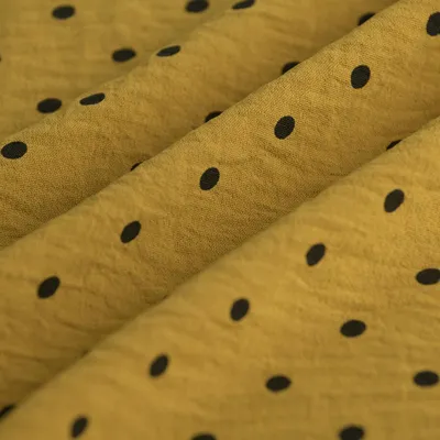 Imagen del producto de Tejido crepé, 147 cm de ancho, color con puntos ocre, modelo MT
