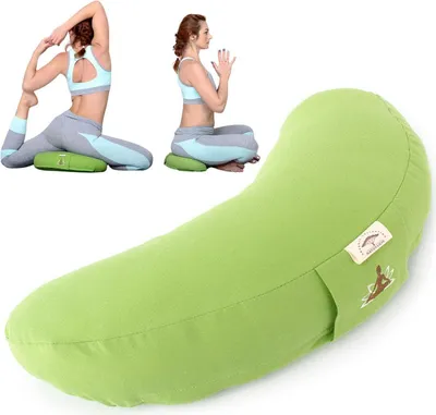A large green crescent-shaped pillow is shown in the foreground, with two smaller images of a woman doing yoga poses on green cushions in the background.