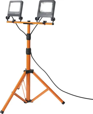 A portable LED work light with two heads mounted on an orange tripod stand, shown against a white background.
