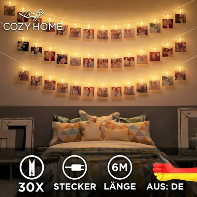 Produktbild von LED Fotoclips Lichterkette – 6 Meter | Mit Netzstecker NICHT batterie-betrieben mit An-/Aus-Schalter| 30 LED Klammern warm-weiß | Fotoleine für Polaroid Foto | Deko Kette zum Aufhängen von Fotos | CozyHome Lichterketten