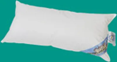 A white pillow is shown against a teal background.