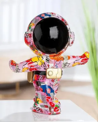 Produktbild von Gilde Figur, Astronaut, "OOH LALA", Kunstharz, mehrfarbig, VE 1, L. 15 cm, B. 26 cm, H. 30 cm 62757