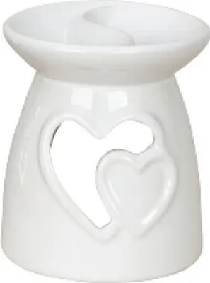Weiße Keramik-Duftlampe mit der Form zweier ineinander verschlungener Herzen.