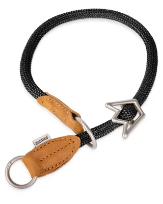 A black dog collar with leather accents and a silver metal buckle is displayed against a white background.