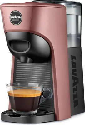 A close-up shot of a Lavazza coffee machine with a cup of espresso.