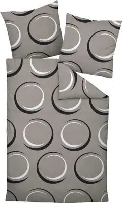 A set of bedding with a circular pattern.