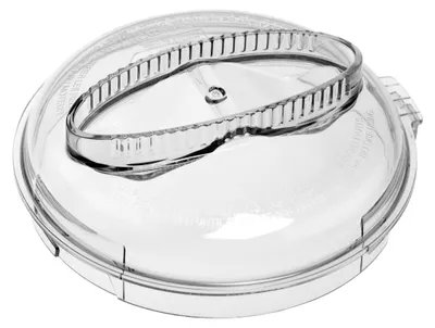 A clear plastic lid for a food processor.