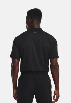 A man wearing a black polo shirt and black pants, viewed from the back.