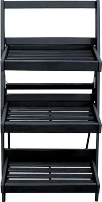 A black, three-tiered plant stand.