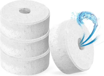 A stack of white, circular dehumidifier refill packs and one pack with water being absorbed.