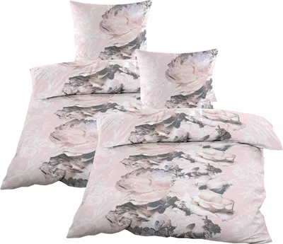 A set of bedding with a floral pattern.