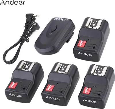 Obrázok produktu pre Sada bezdrôtových diaľkových spúšťačov blesku Andoer s 16 kanálmi: 1 vysielač + 4 prijímače + 1 synchronizačný kábel pre Canon, Nikon, Pentax, Olympus, Sigma, Sunpak, Vivitar, Neewer, YOUNGNUO a Speedlite