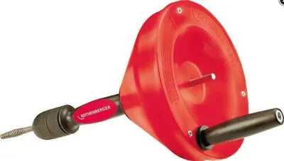 A red and black drain snake tool on a white background.