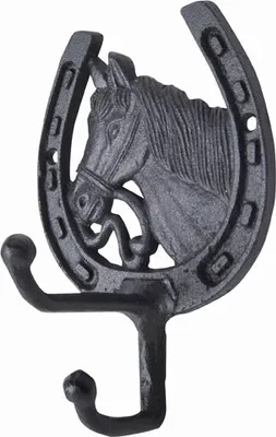 A black cast iron horse head and horseshoe wall hook.