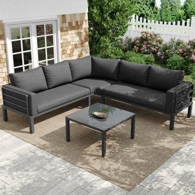 Immagine prodotto di Set di mobili da giardino (4-5 posti), 1 tavolino in vetro temperato con struttura in ghisa, comodi mobili da giardino, cuscini di seduta e cuscini decorativi grigi, con gambe regolabili
