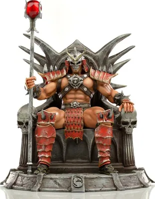 A statue of Shao Khan from Mortal Kombat sitting on a throne.