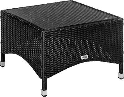 A black polyrattan coffee table with a glass top, shown from a slightly elevated angle.