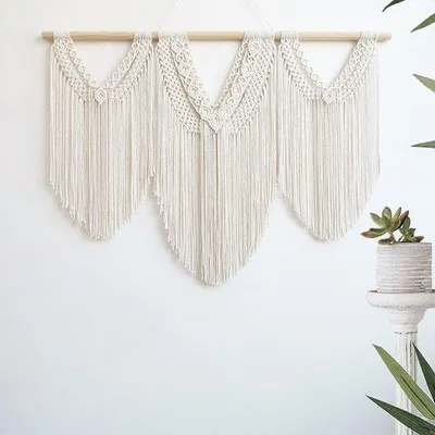 Produktbild von Unyqoos® Macramé Wandbehang, 3‑teiliger Boho Wandteppich – Elfenbein, Baumwollseil & Holz, 110 cm Stab, 82 cm Fransen