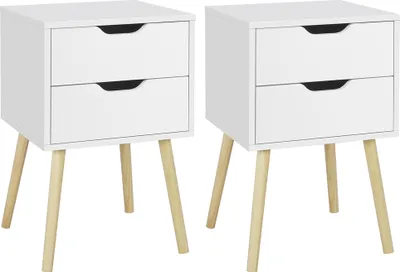Two white nightstands with wooden legs are shown against a white background.