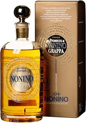 A bottle of Nonino Grappa Monovitigno Vigneti Prosecco and its packaging.