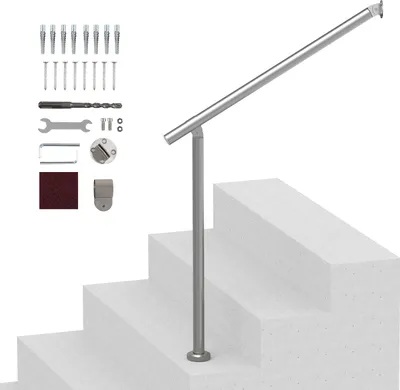 A silver handrail kit is shown assembled on a set of concrete stairs, with various mounting hardware and tools laid out to the left.