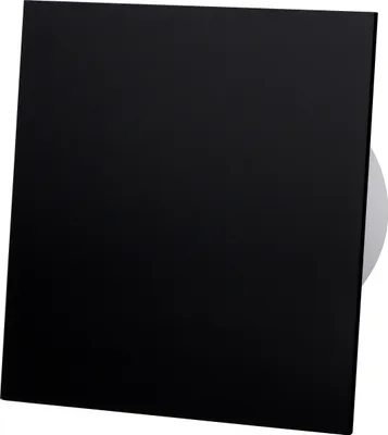 A plain black square object, likely a vent cover or a similar item, is shown against a white background. A light grey, out-of-focus curved element is visible on the right side, possibly part of the object's packaging or a reflection.