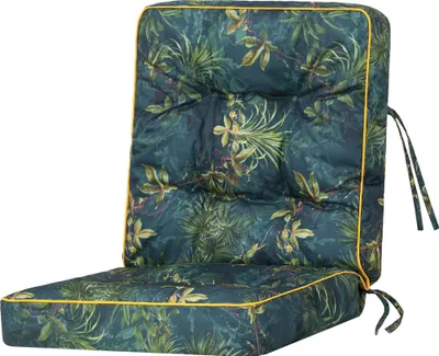A chair cushion with a tropical leaf pattern and yellow trim, shown against a white background.
