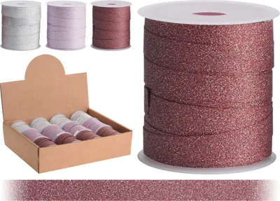 A display of glitter ribbon rolls in various colors, with a large roll prominently featured.