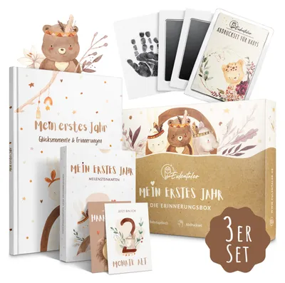 A collage of images showing a baby memory book, milestone cards, and a handprint kit, presented in a gift box.