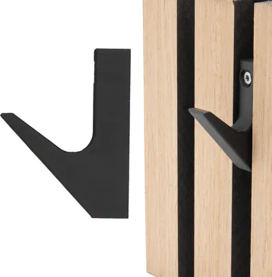 A black hook is shown next to a wooden panel with a hook attached.