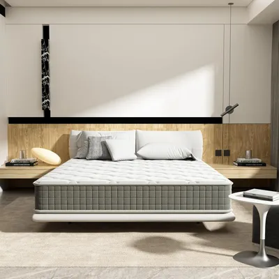 A mattress on a bed frame in a bedroom setting.