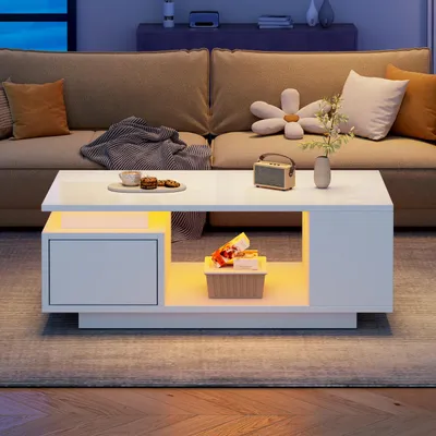 Produktbild von MODFU Couchtisch Weiß Wohnzimmertisch mit LED,Hochglanz-Sofatisch mit Durchbrochenen Design,Beistelltisch mit Schublade und mit vier seitlichen,100×50×36cm