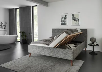 Produktbild von Meise Möbel Stauraumbett Riva 180x200 cm | Doppelbett | Bettkasten & Lattenrost (Federholzrahmen) | Webstoff Mausgrau | Holzfuß eichefarbig