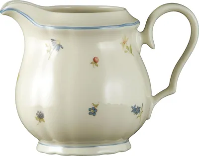 Produktbild von Krug - Elfenbeinfarben - Porzellan - mit blauem Rand - mit Streublumenmotiv - 450 ml